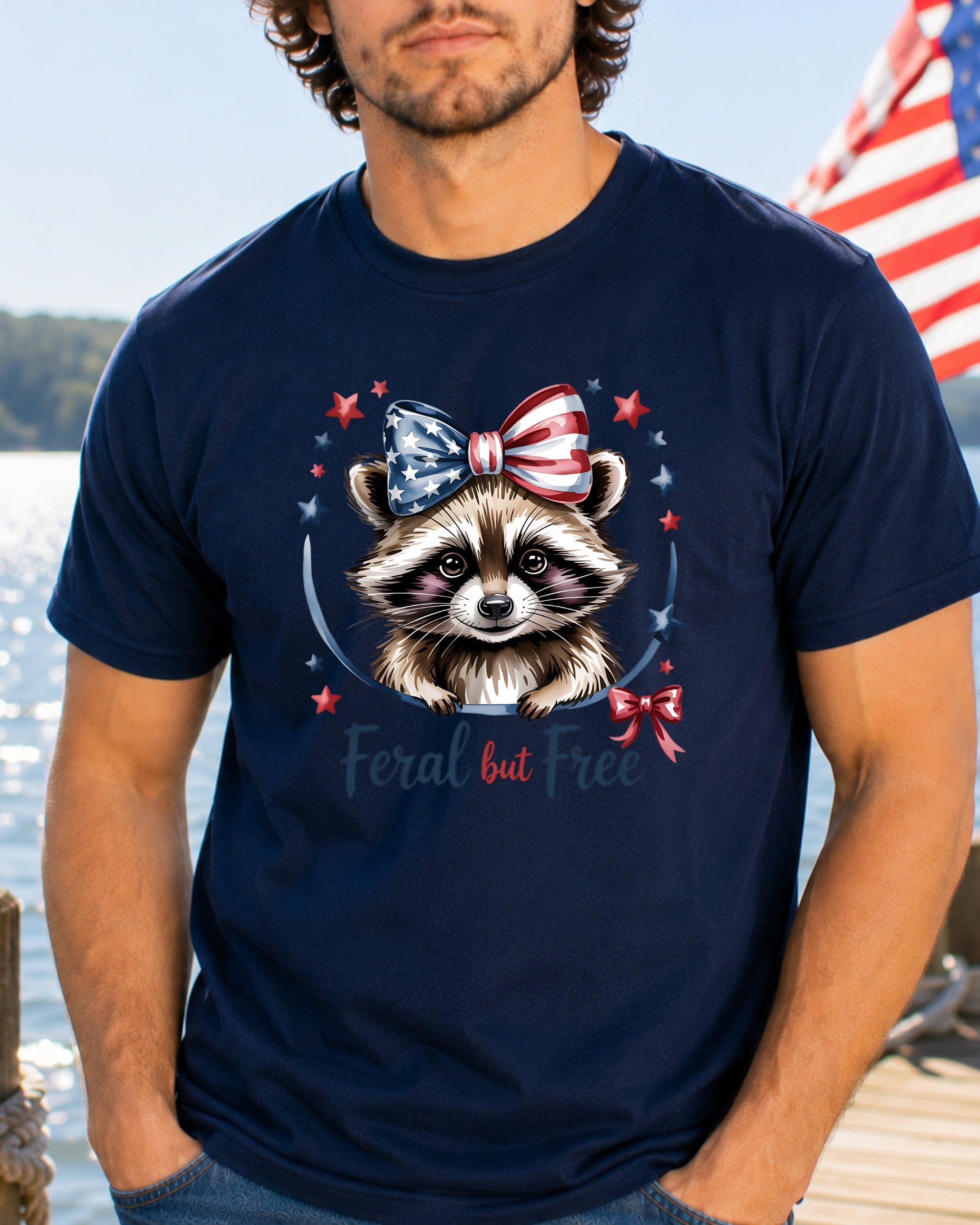 Raccoon in patriotic bow and stars, "Feral but free" text.
