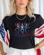 Black t-shirt with dancing skeletons, USA flag, and patriotic text.