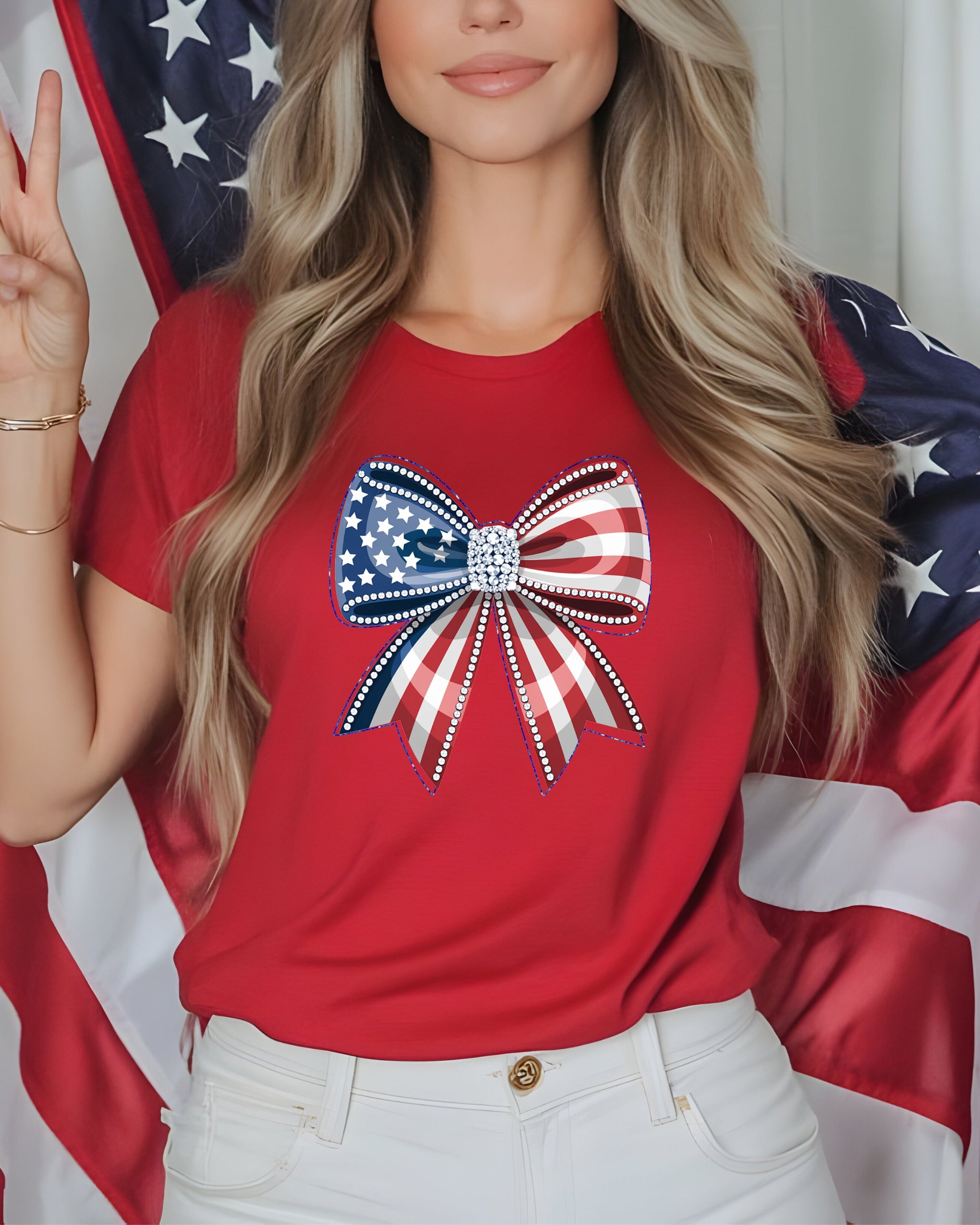 Woman in red t-shirt with American flag bow graphic, holding US flag.