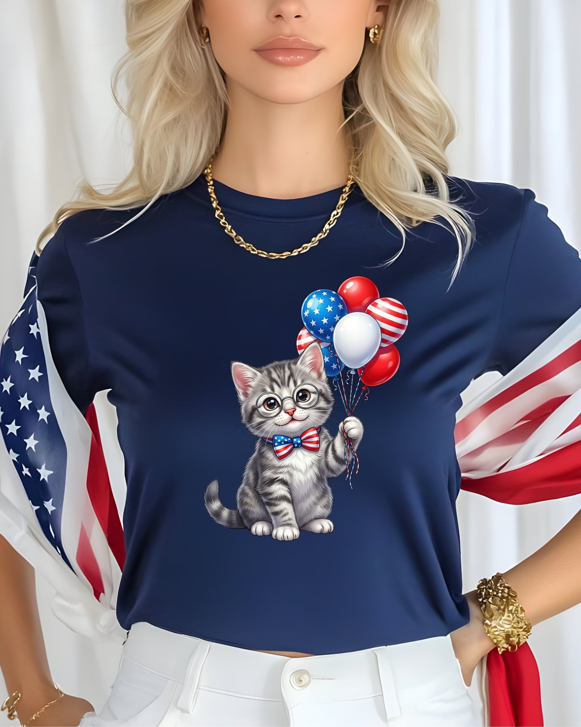 T-shirt with patriotic kitten holding balloons and American flag accents.