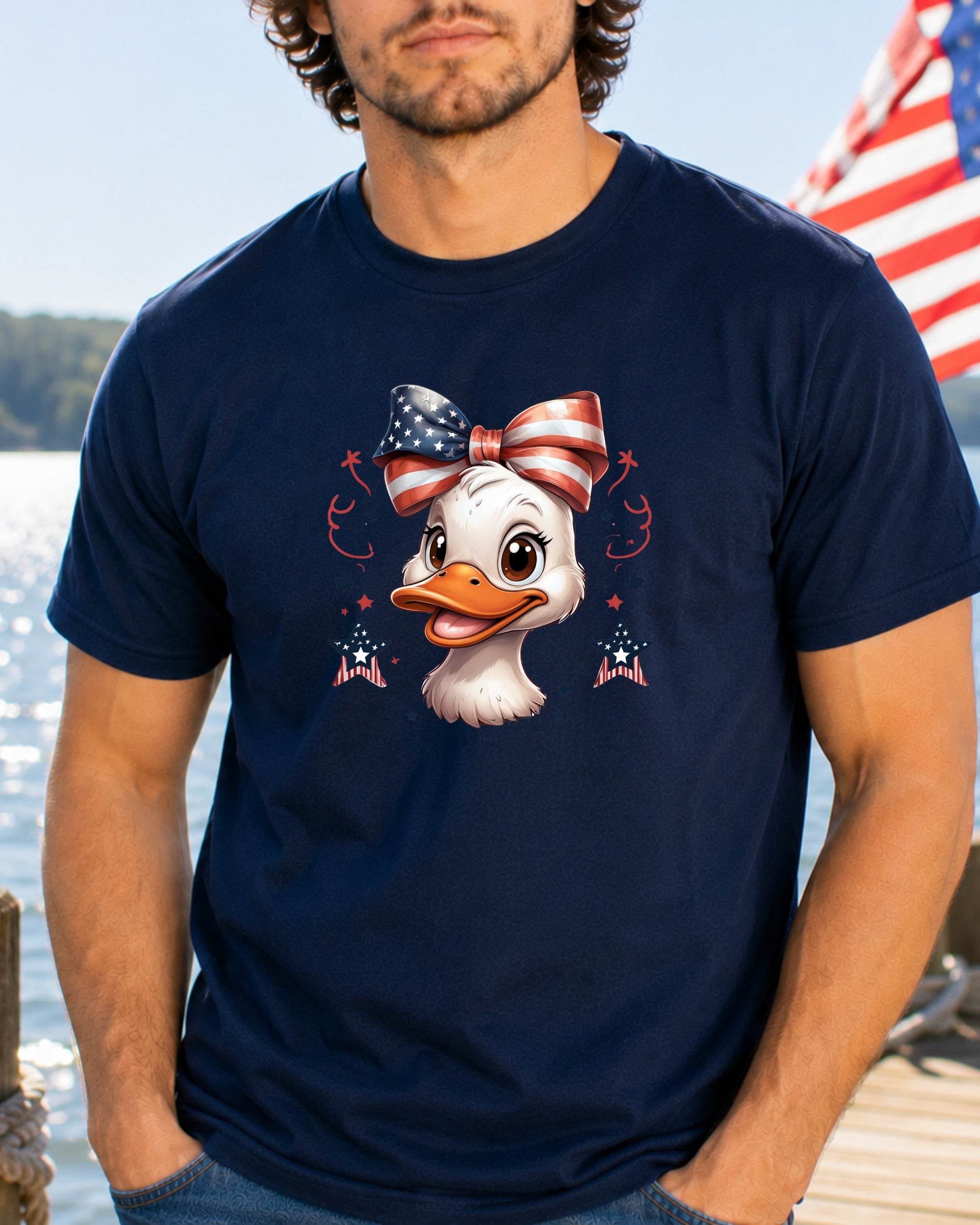 Cartoon duck wearing a patriotic bow on a navy t-shirt.