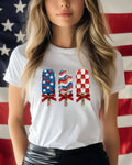 White t-shirt with three popsicle designs, one American flag themed.