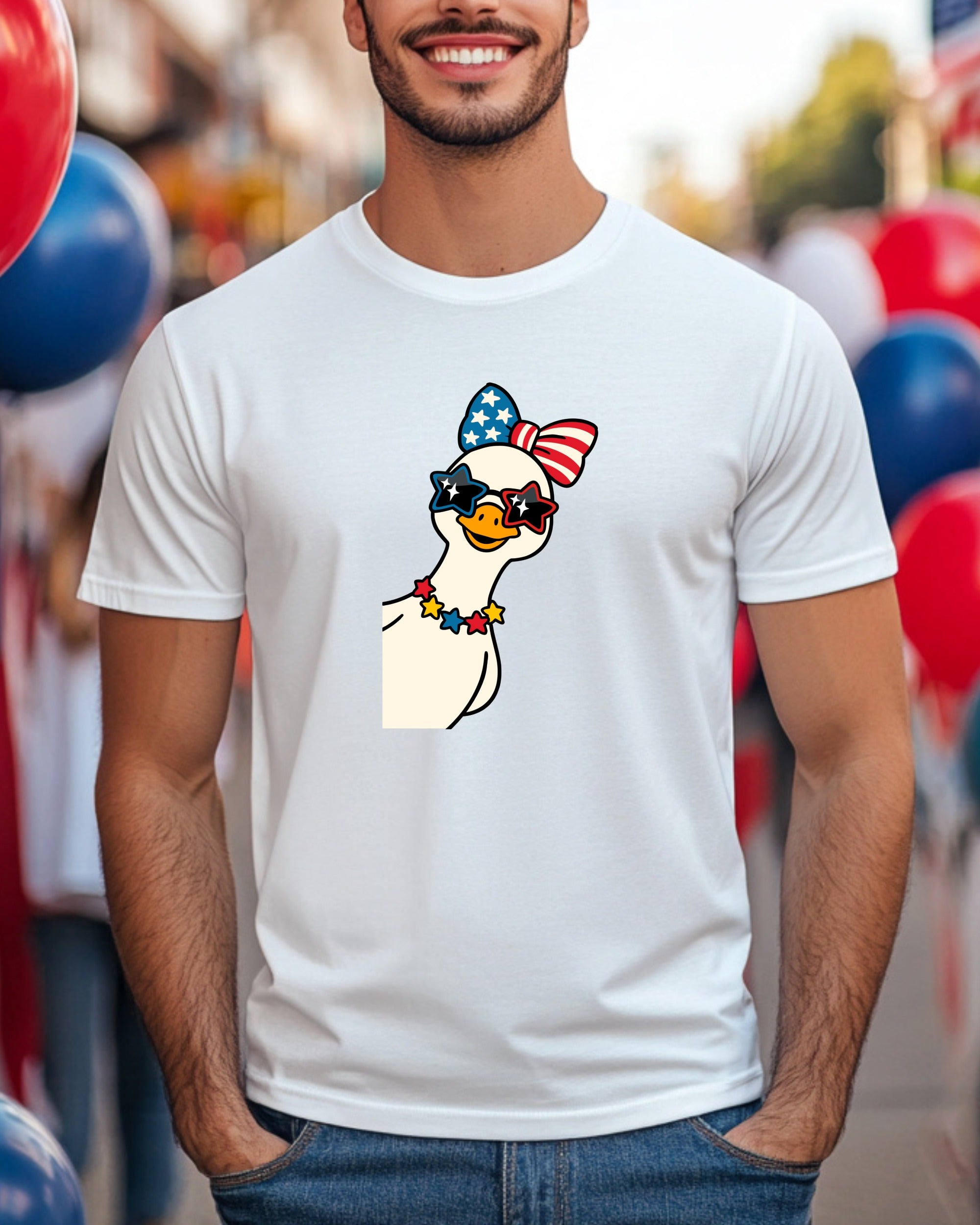Duck wearing patriotic sunglasses and a bow tie on a white t-shirt.