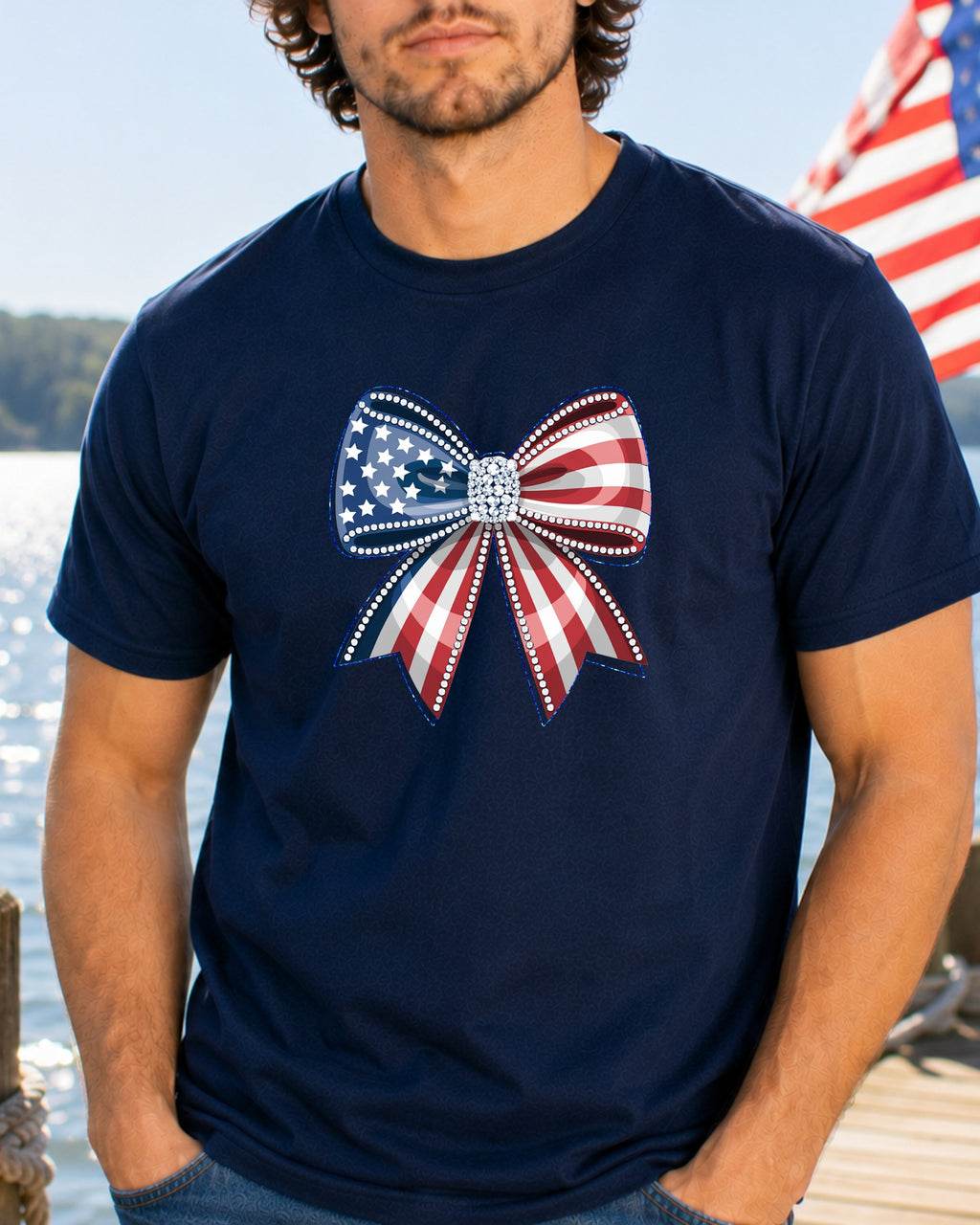 Navy t-shirt with a red, white, and blue patriotic bow graphic.