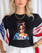 Woman wearing black t-shirt with "USA" graphic and American flag accents.