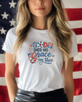 White t-shirt with "God Shed His Grace on Thee" patriotic graphic.