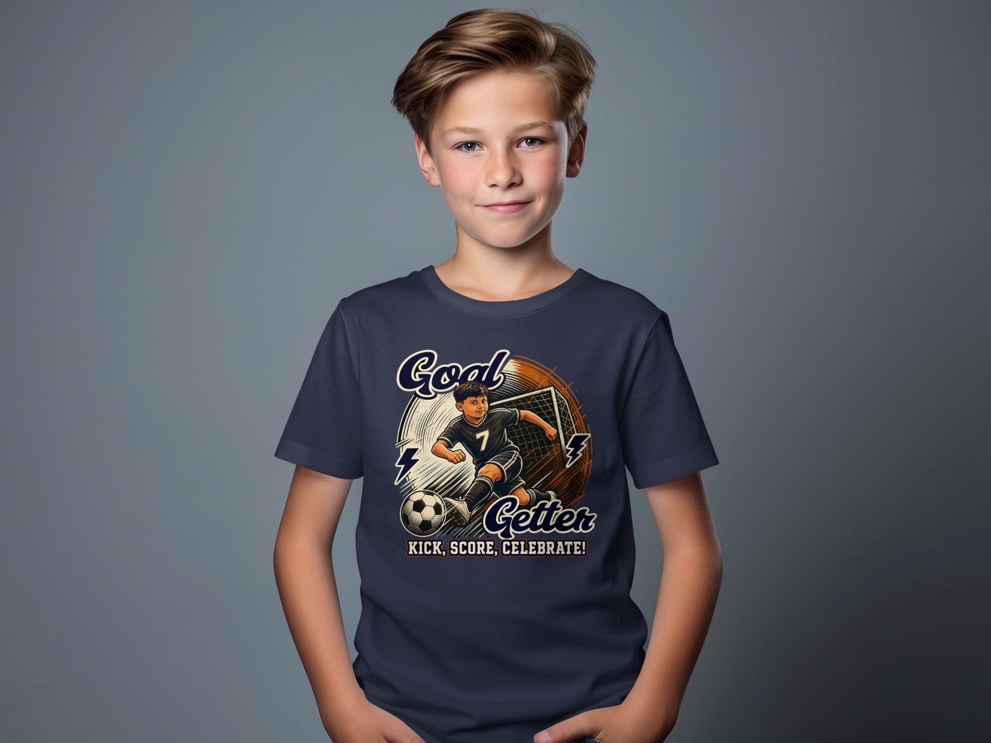 Boy in navy t-shirt with soccer player kicking ball and text "Goal Getter".