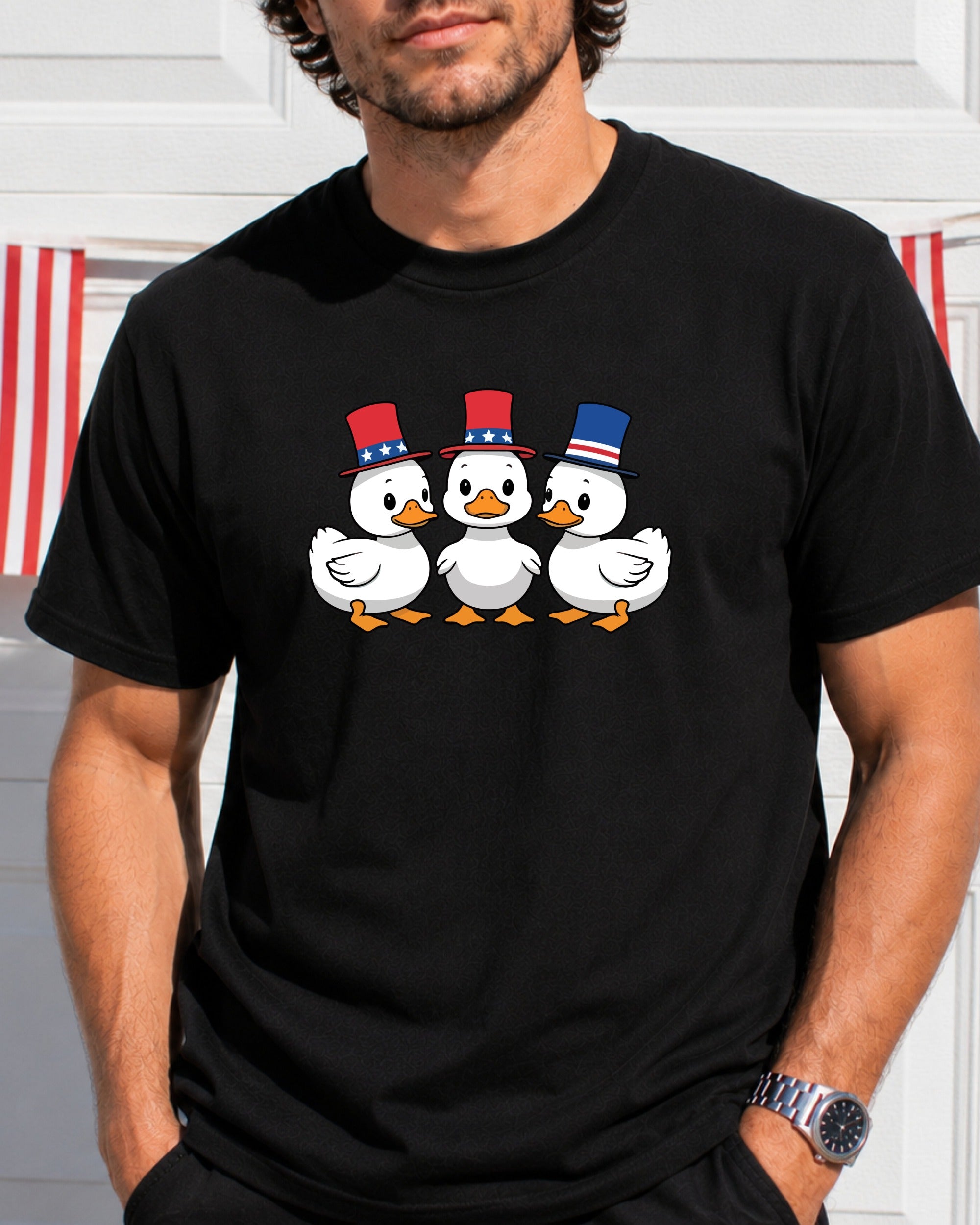 Three cartoon ducks wearing patriotic hats.