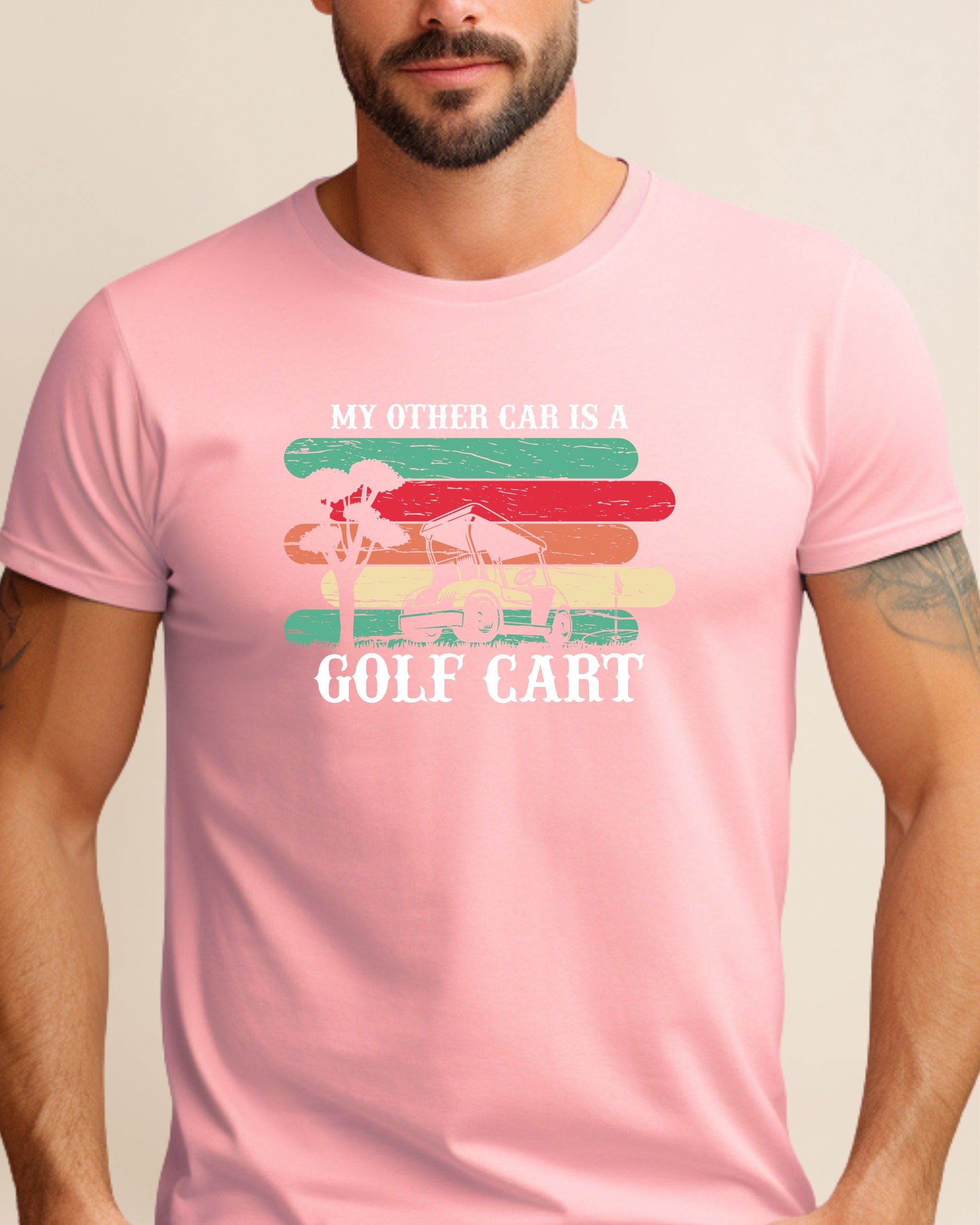 Pink t-shirt with "My other car is a golf cart" text and striped graphic.