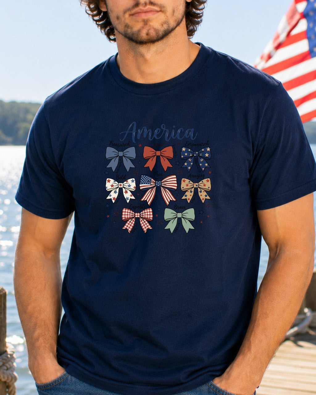 Navy t-shirt with patriotic bows and "America" text.