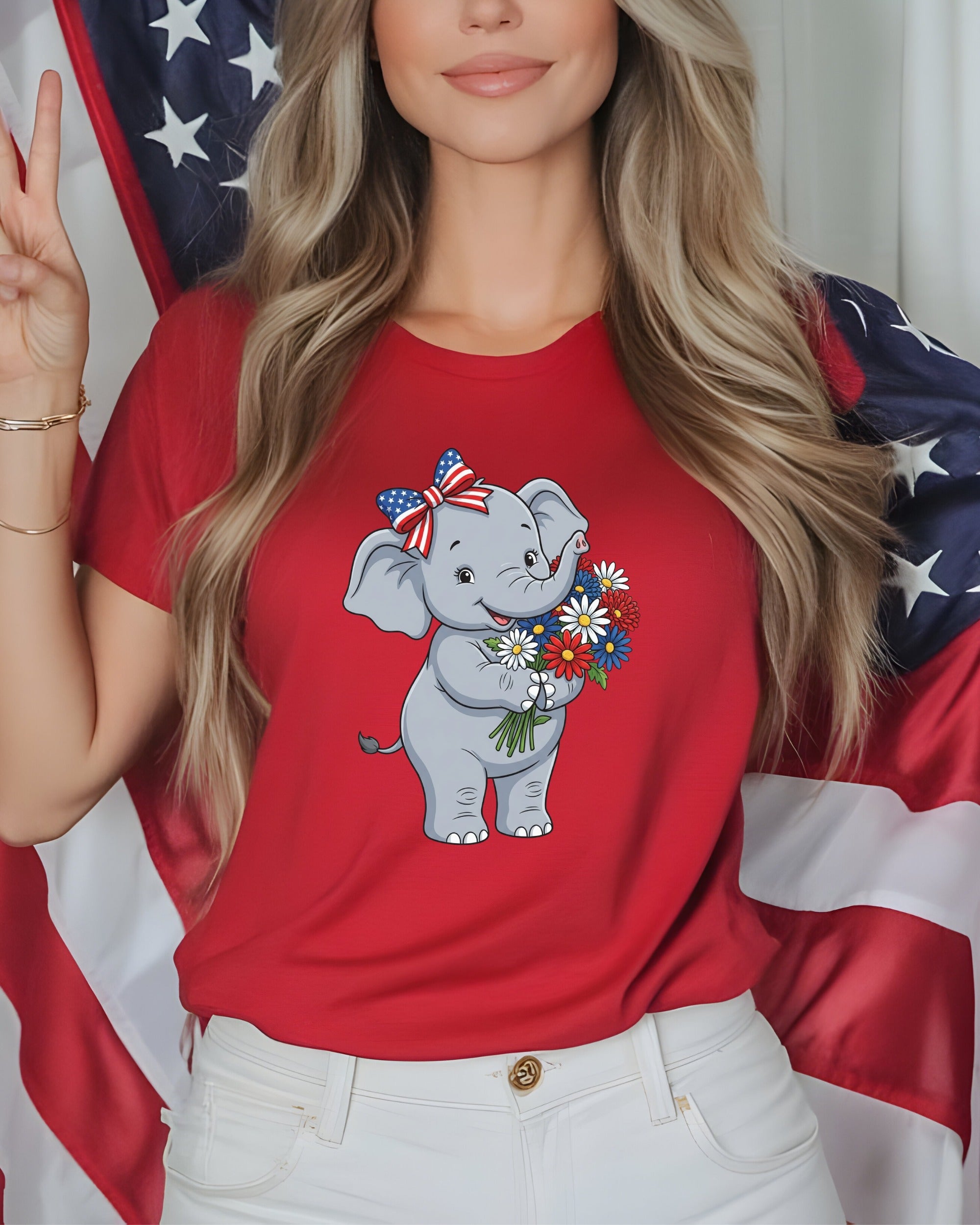 Red t-shirt with cartoon elephant holding flowers and American flag.