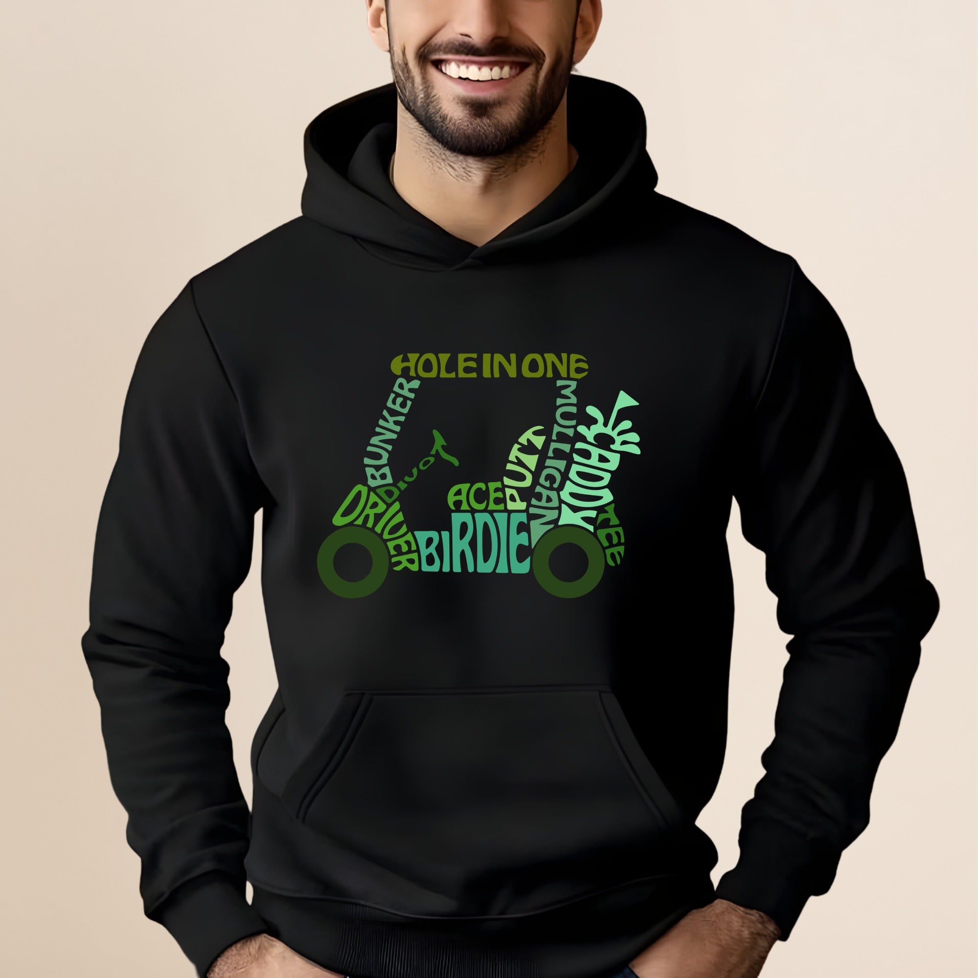 Black hoodie with a green word cloud graphic of golf terms and a golf cart.