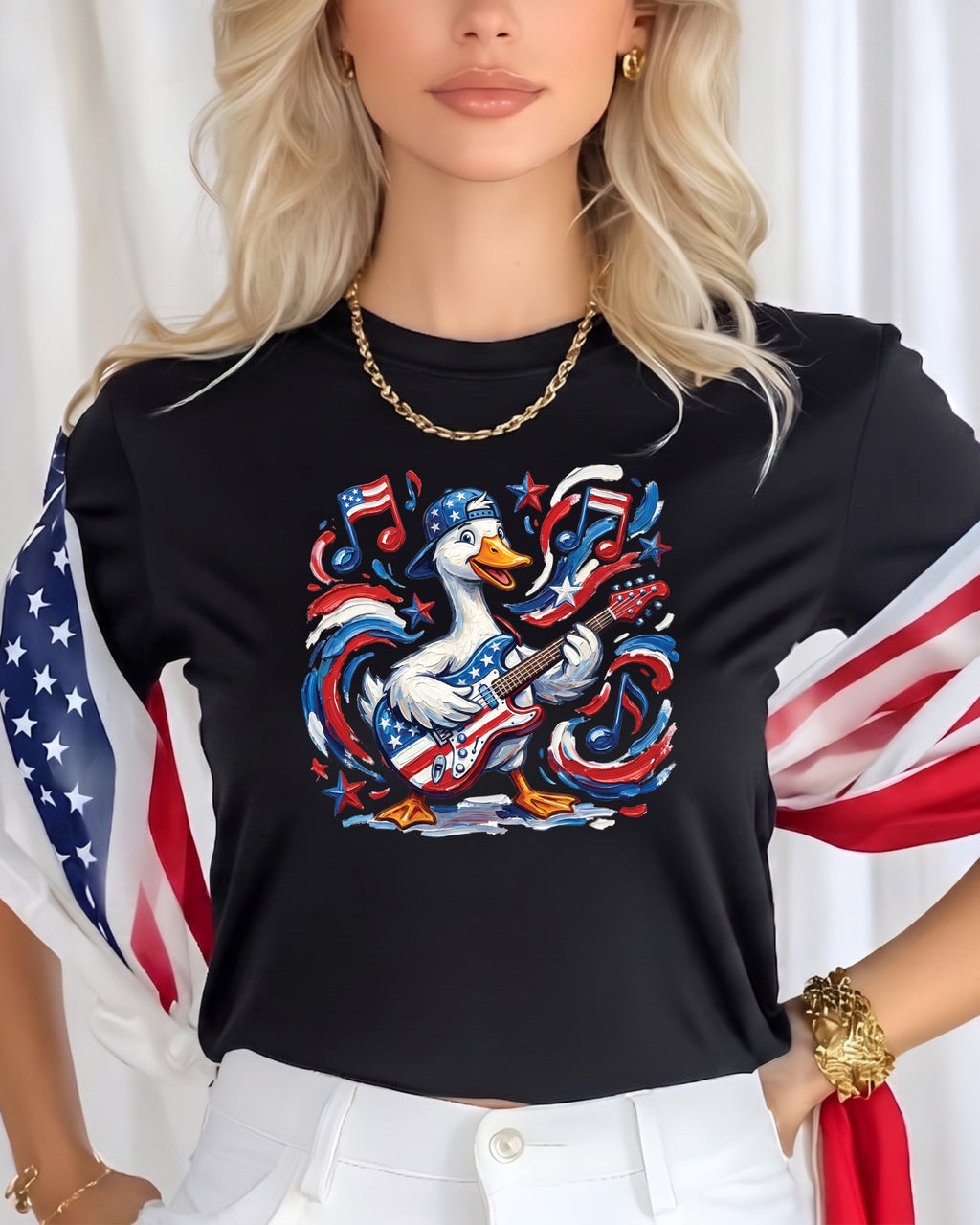 Black t-shirt with patriotic duck playing guitar, USA flag accents.