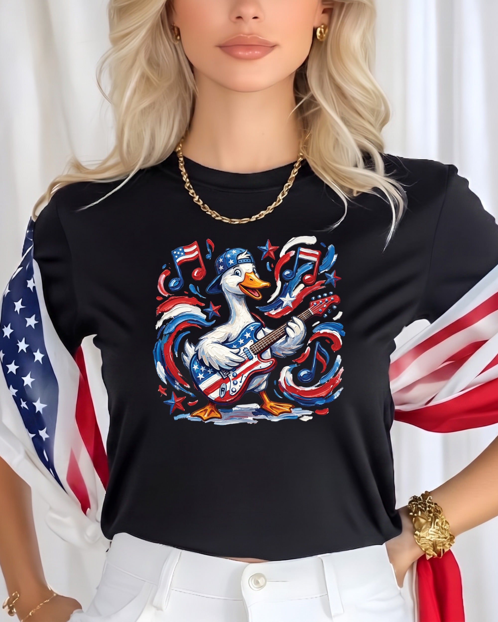 Black t-shirt with patriotic duck playing guitar, USA flag accents.