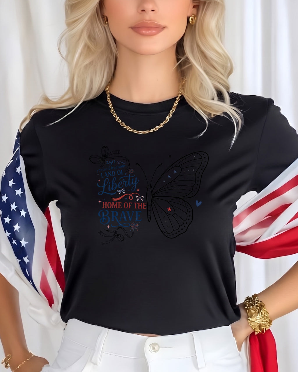 Black t-shirt with a butterfly design and "Land of the Free, Home of the Brave" text.