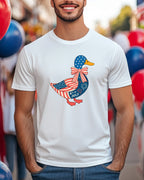 White t-shirt featuring a duck graphic with American flag design and "4th of July" text.