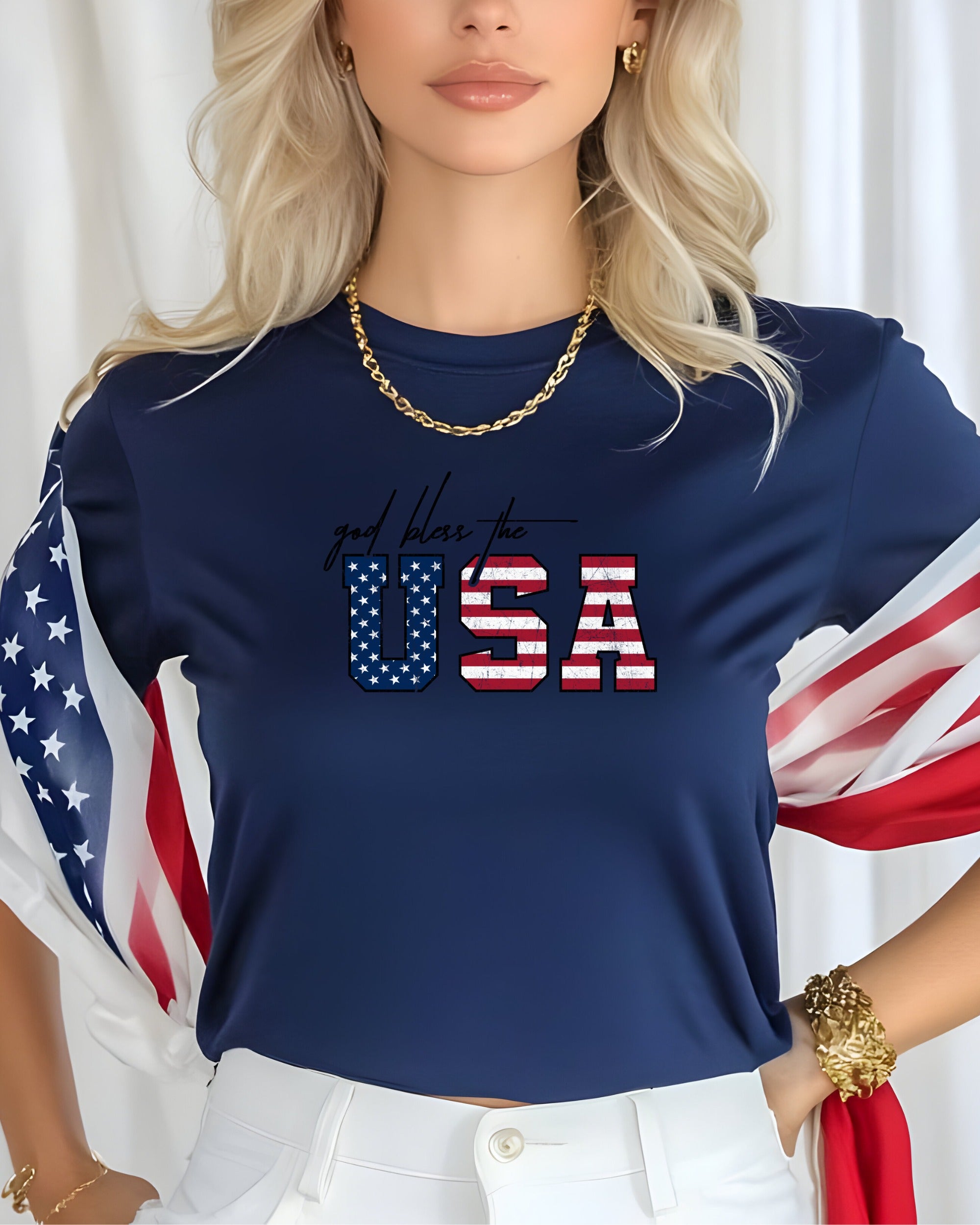 Navy t-shirt with "God Bless the USA" graphic in American flag print.
