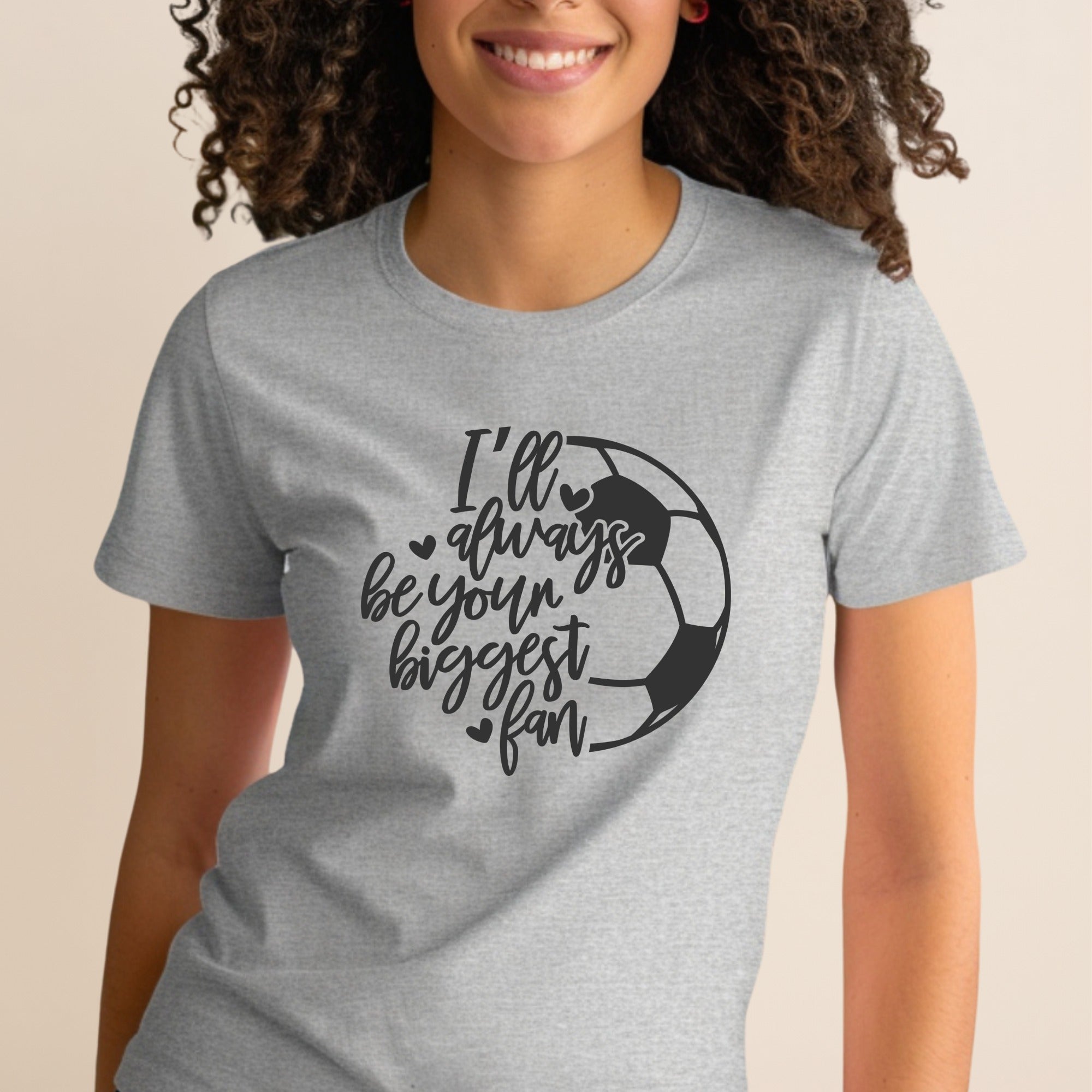 Grey t-shirt with black text and a soccer ball graphic.