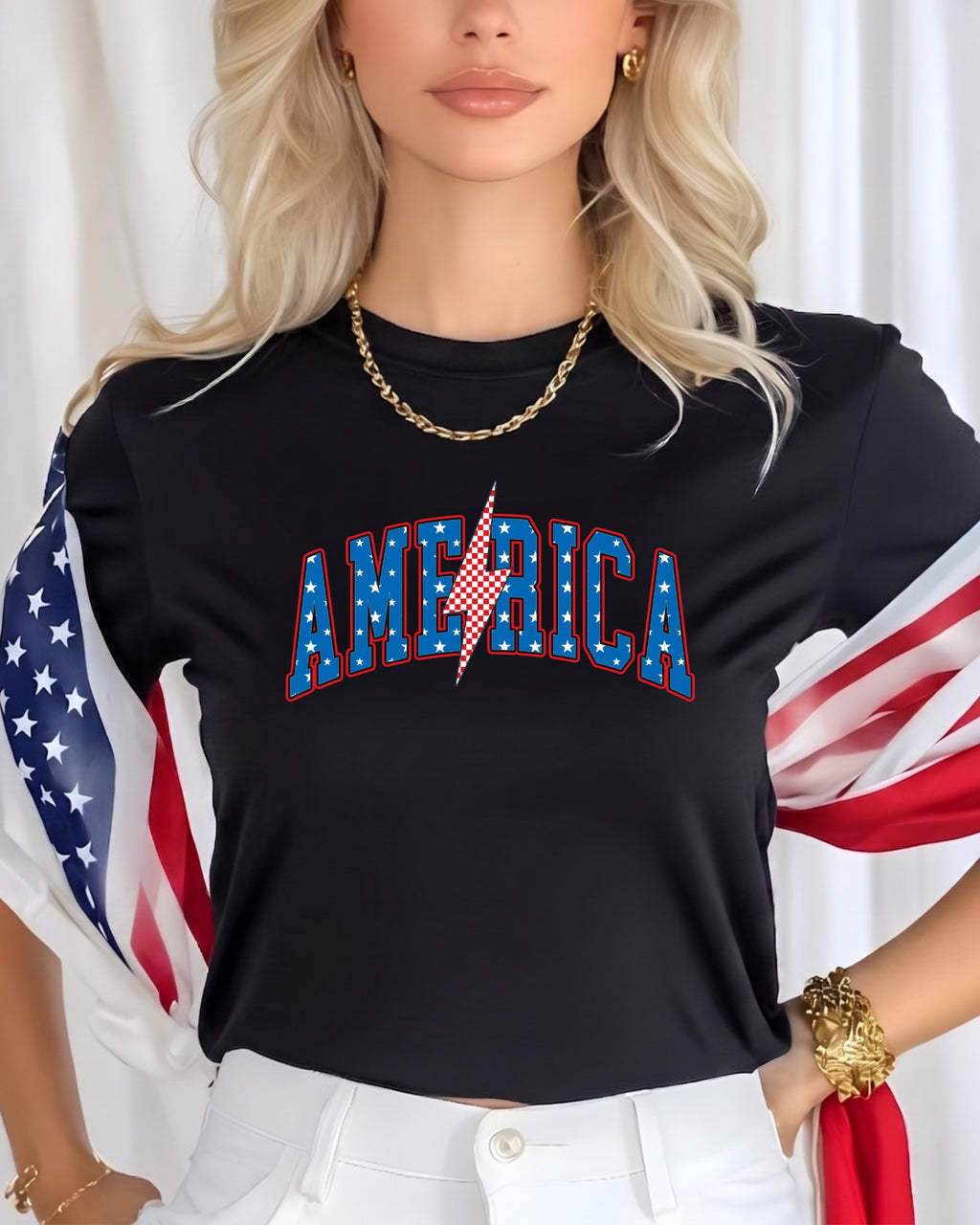 Black t-shirt with "AMERICA" in red, white, and blue lightning bolt letters.
