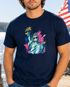 Statue of Liberty blowing bubblegum, with colorful abstract accents, on a navy t-shirt.