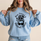Light blue sweatshirt with "One proud baseball mama" and sunglasses graphic.