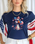 Patriotic duck wearing sunglasses with American flag shirt and fireworks.