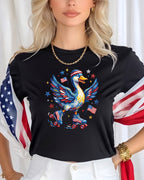 Duck in roller skates with American flag wings, wearing a patriotic t-shirt.