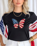 Black t-shirt with a red, white, and blue butterfly wing design.
