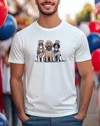 Three dogs wearing American flag bandanas and hats sit together.