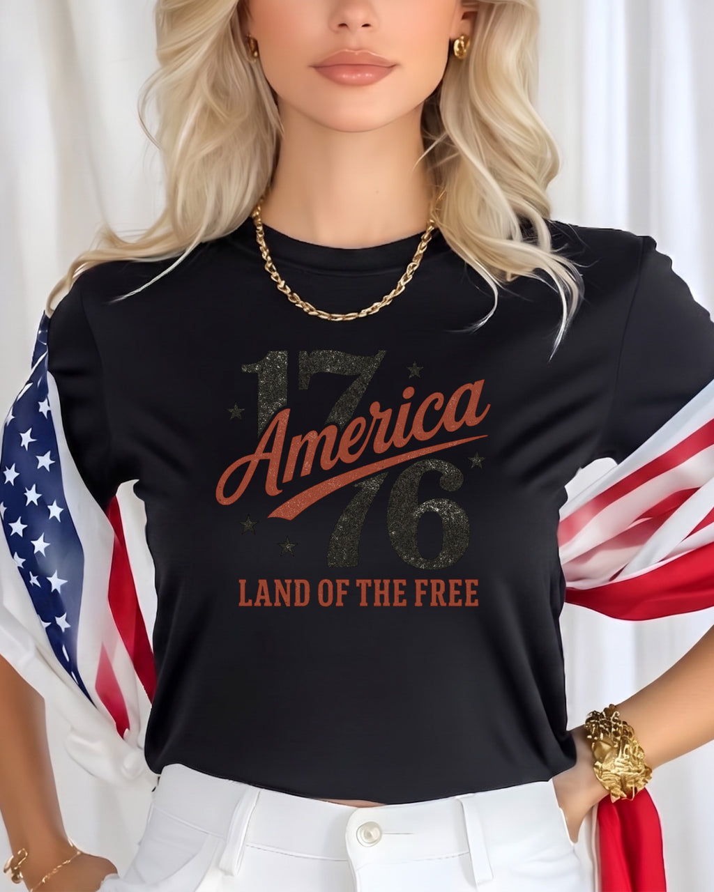 Black t-shirt with "1776 America Land of the Free" text, US flag draped.
