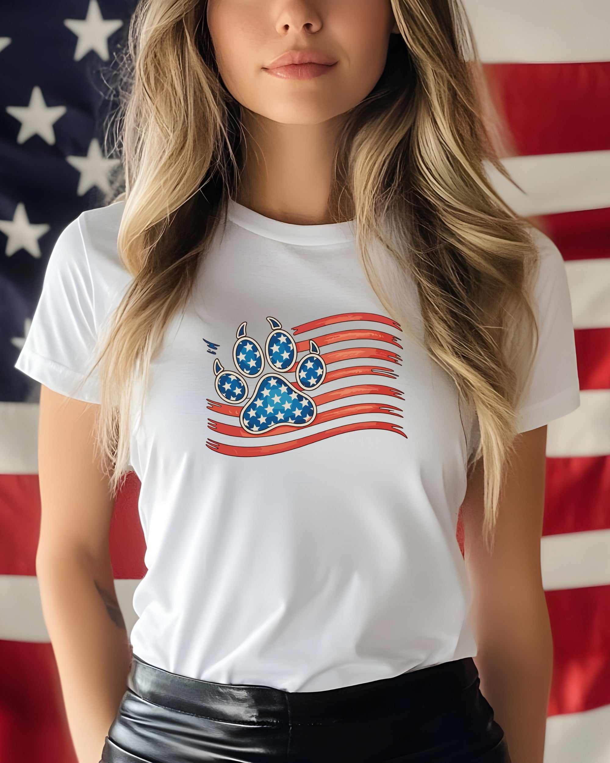 White t-shirt with a paw print design in American flag colors.