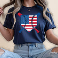Baseball graphic with American flag on a dark blue t-shirt.