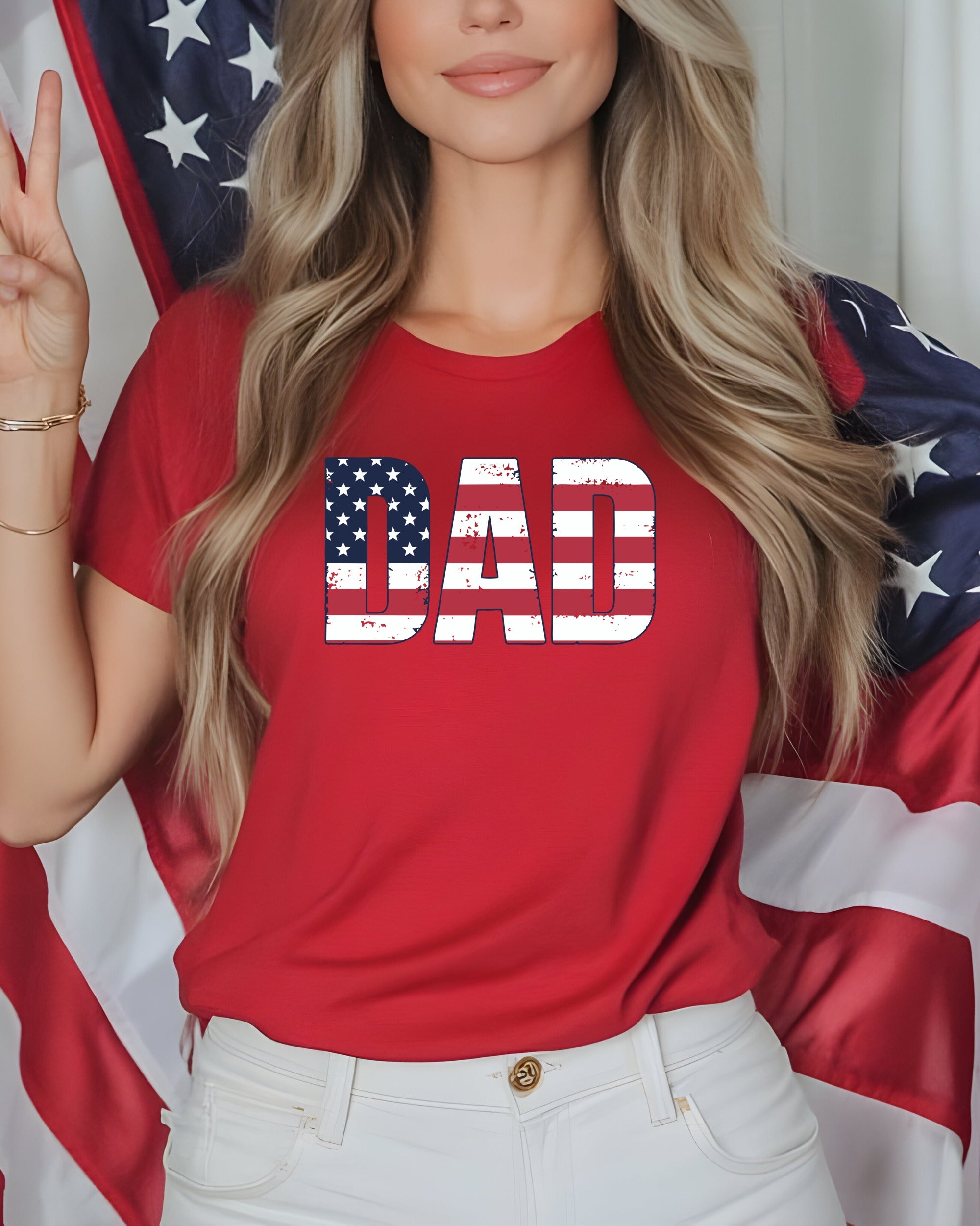 Red t-shirt with "DAD" in American flag lettering, woman holding flag.