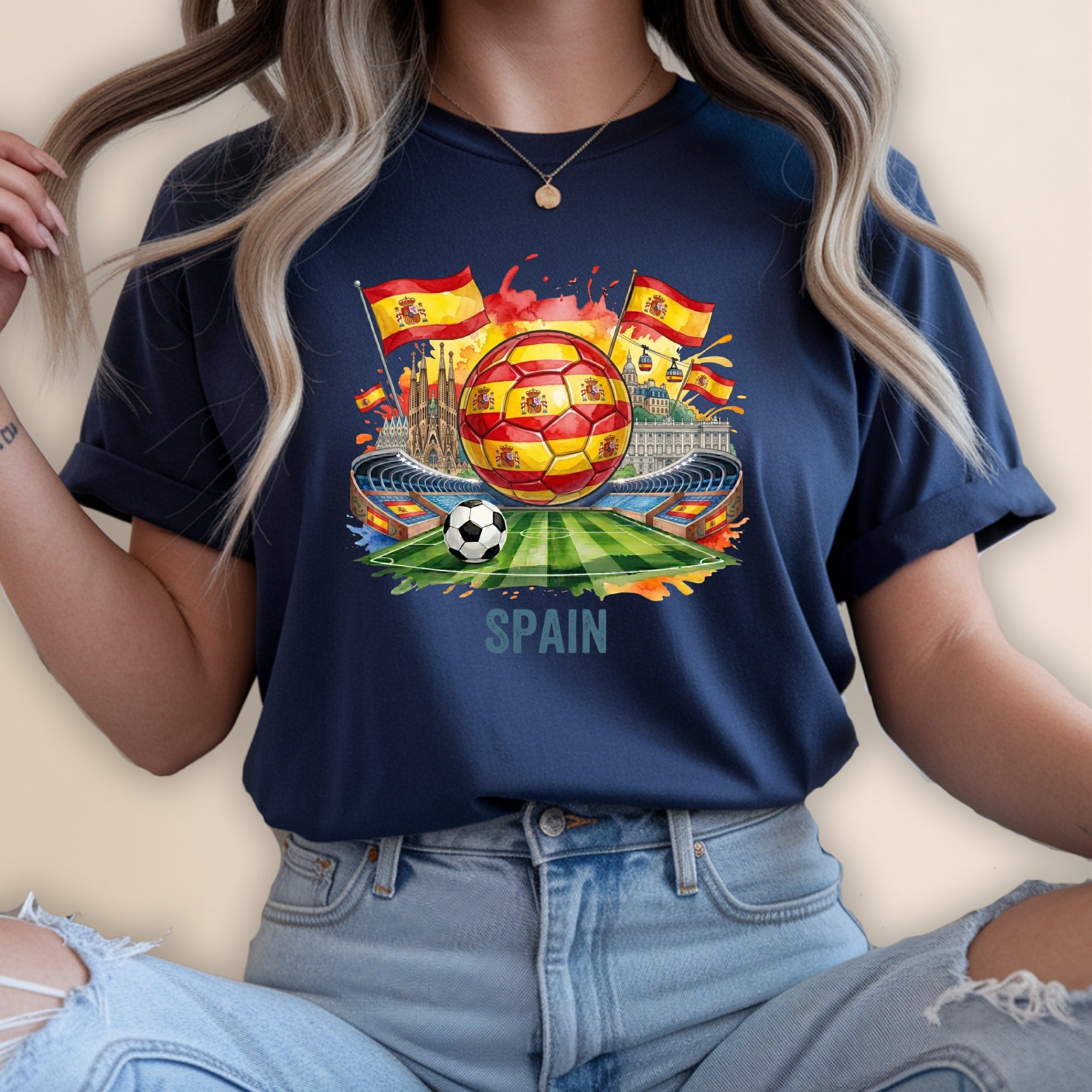 T-shirt with Spain soccer stadium, flag, and ball graphic.