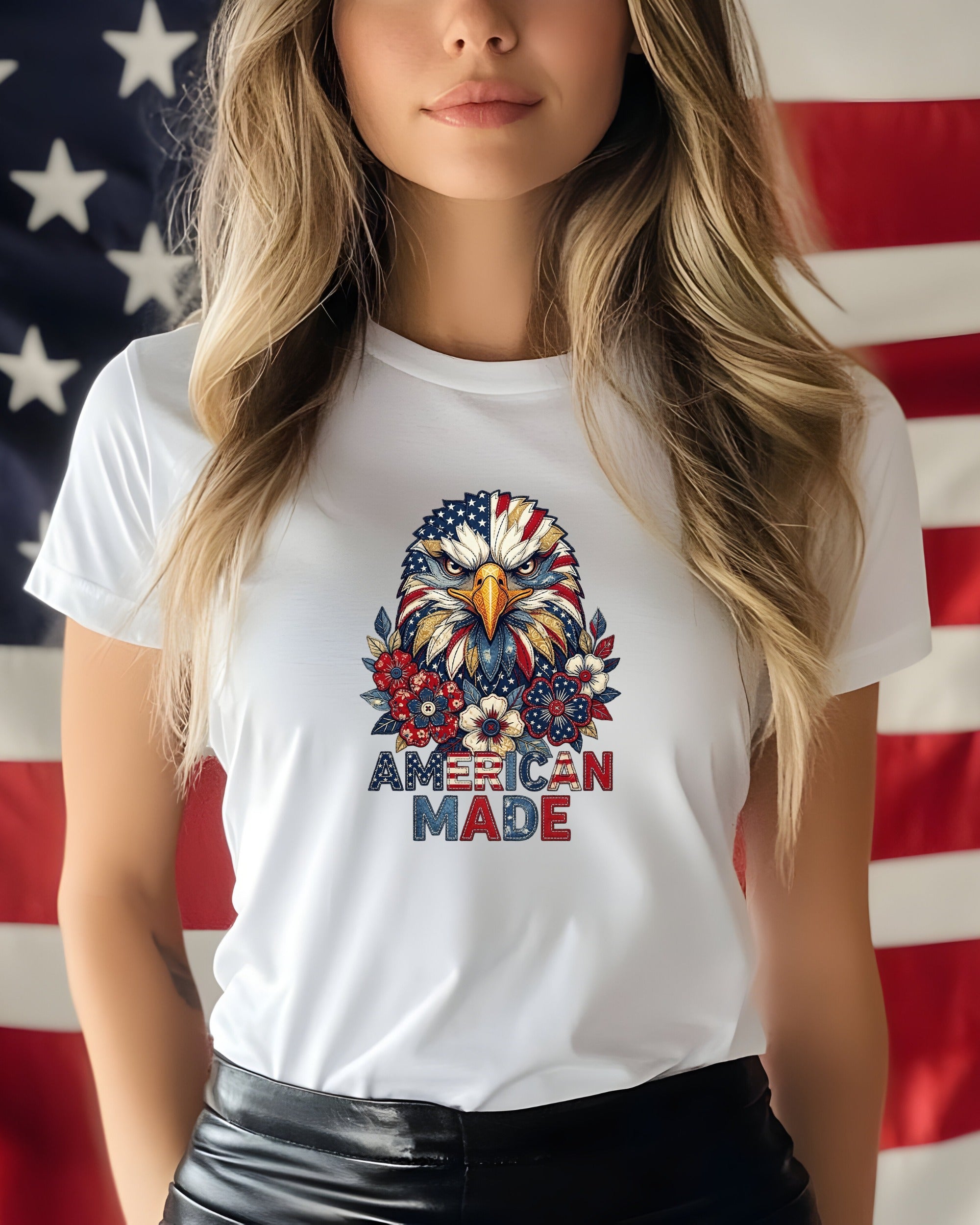 White t-shirt with eagle and flowers, "AMERICAN MADE" text.