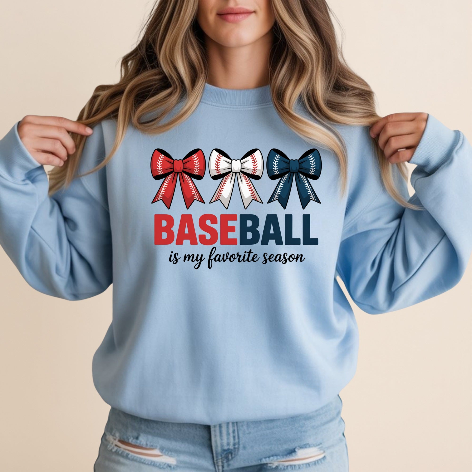 Light blue sweatshirt with "BASEBALL is my favorite season" text and baseball ribbon graphic.