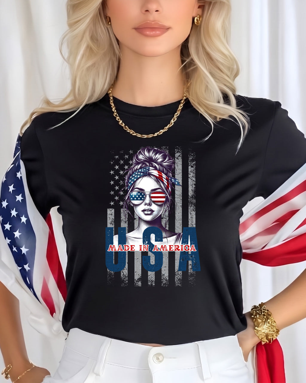 Woman wearing black t-shirt with "Made in America" USA flag graphic.