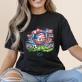 Black t-shirt with USA flag, eagle, soccer ball, and stadium graphic.
