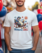 White t-shirt with graphic of duck in Adirondack chair, red, white, and blue patriotic theme.