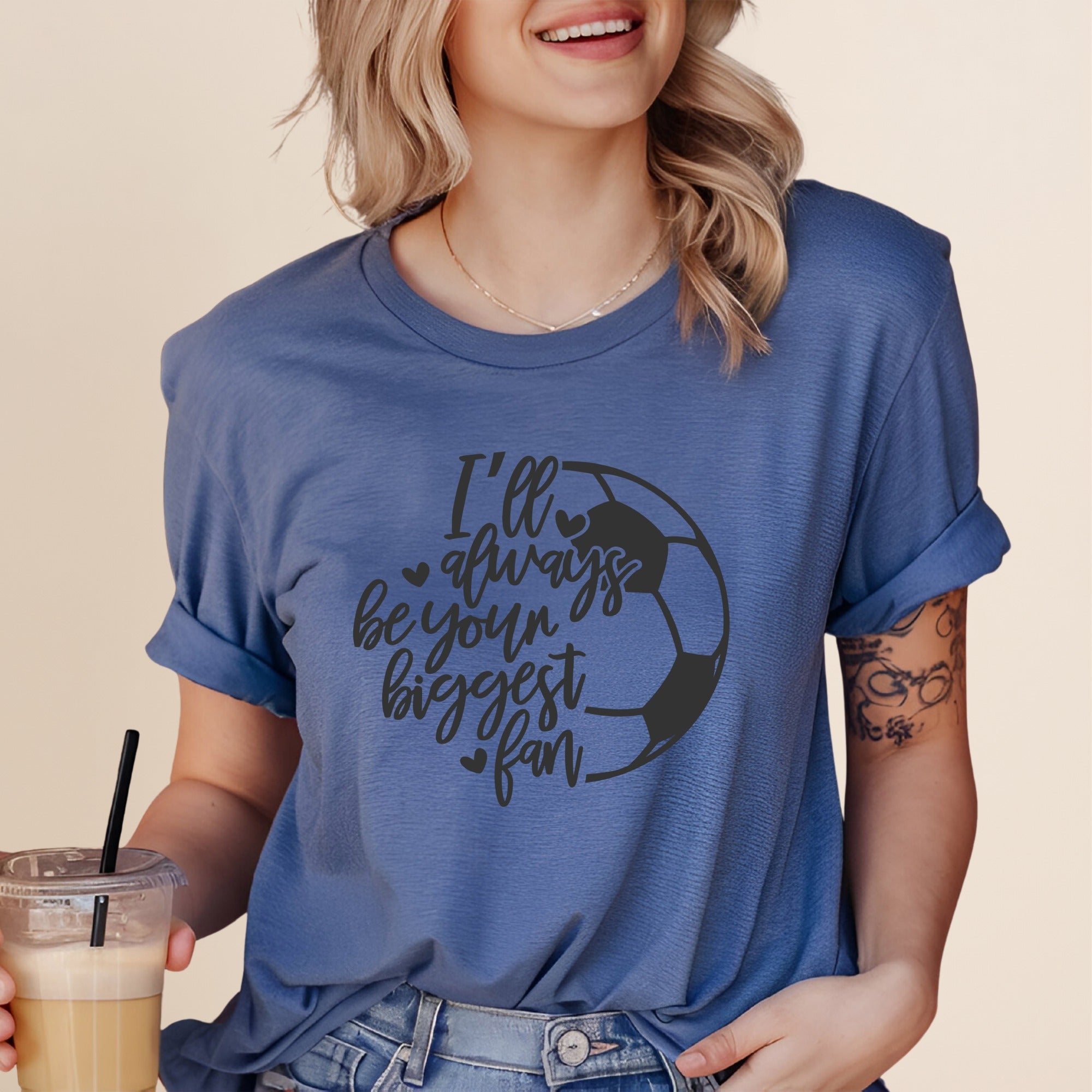 Blue t-shirt with "I'll always be your biggest fan" and soccer ball graphic.