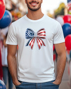 White t-shirt with patriotic red, white, and blue bow graphic.