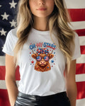Highland cow with stars and flag sunglasses on white t-shirt.
