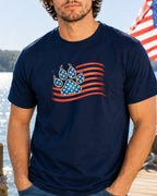 Navy t-shirt with distressed American flag and paw print graphic.