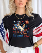 Black t-shirt with a cartoon goose in a beach chair, "Patriotic Chill" text.
